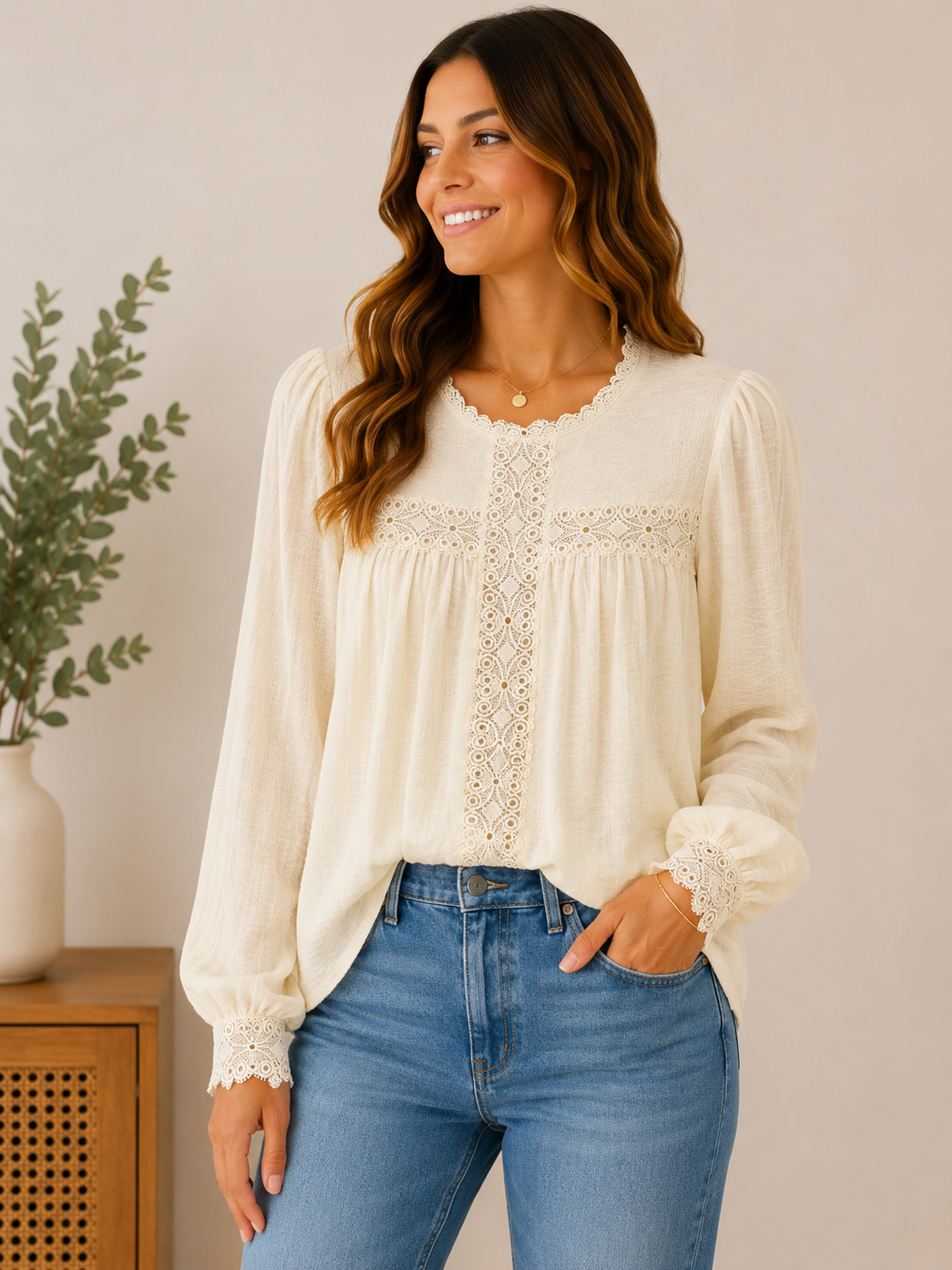 Woman wearing the ivory romance lace-trim blouse in ivory / cream.