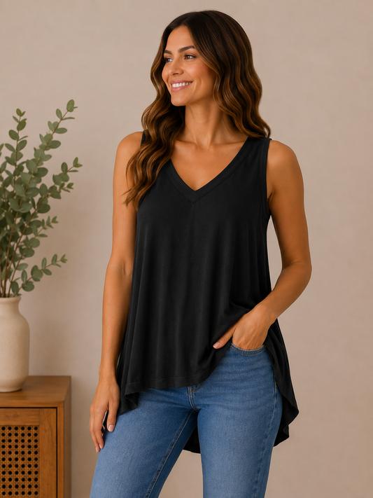 Woman wearing the effortless flow v-neck tank in black.
